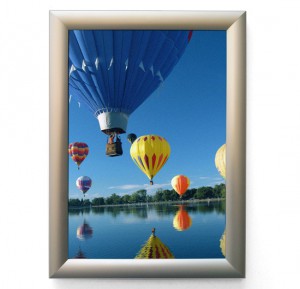 Snapframe poster mounting display from Wild Digital containing a poster of hot air balloons.